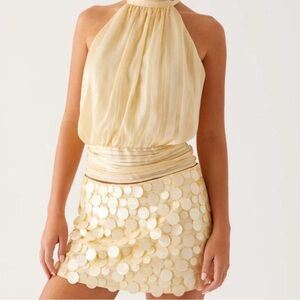 Yellow sequins mini skirt